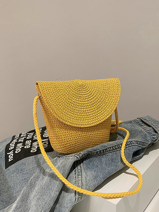 crochet shoulder handbag, mustard, front-view, on light blue denim jacket