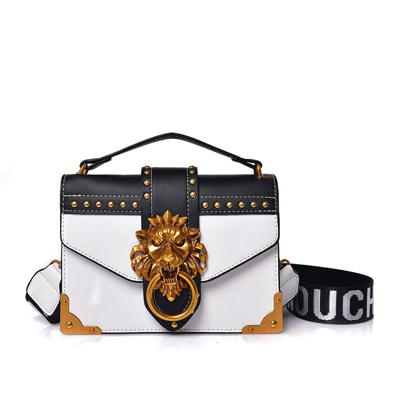 shoulder handbag with metal lion head closure, white, white background