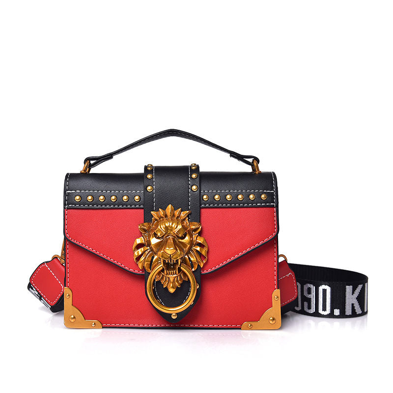 shoulder handbag with metal lion head closure, red, front view, white background