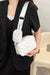 pu leather shoulder handbag with small purse, white, hanging from a woman's shoulder
