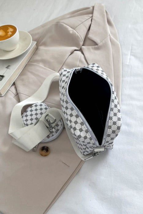 geometric pu leather shoulder bag with small purse, white, top-down interior view, on top of bed